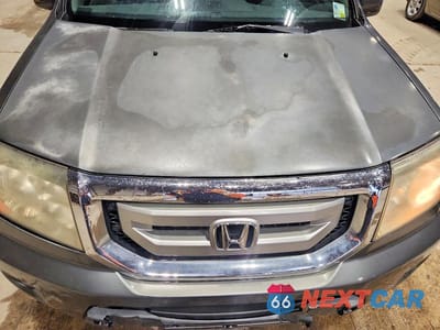 Zdjęcie 12 z 13 samochodu: 2011 HONDA PILOT EXLN VIN:5FNYF3H73BB043188 - miniatura