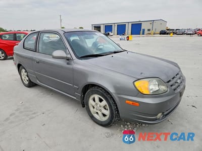 Czwarte zdjęcie samochodu z boku: 2005 HYUNDAI ACCENT GS VIN:KMHCG35C75U322188 - miniatura