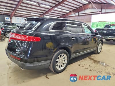 Trzecie zdjęcie samochodu z tyłu: 2014 LINCOLN MKT VIN:2LMHJ5NK7EBL55938 - miniatura