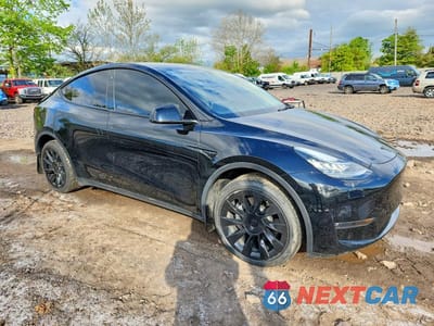 Czwarte zdjęcie samochodu z boku: 2022 TESLA MODEL Y VIN:7SAYGDEE1NF447829 - miniatura