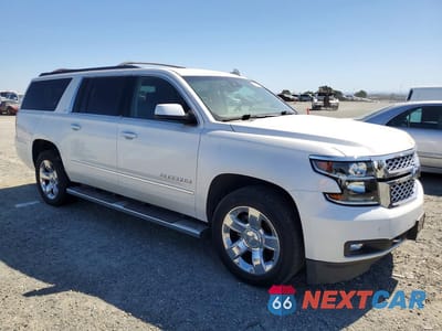 Czwarte zdjęcie samochodu z boku: 2017 CHEVROLET SUBURBAN K1500 LT VIN:1GNSKHKC2HR289163 - miniatura