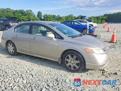Czwarte zdjęcie samochodu z boku: 2006 HONDA CIVIC LX VIN:1HGFA15576L020031 - miniatura