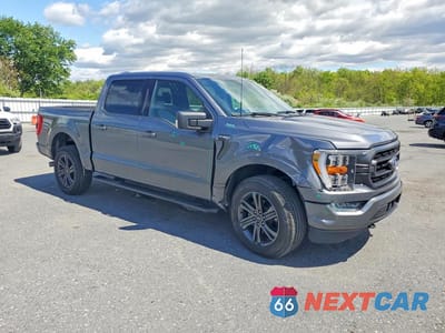 Czwarte zdjęcie samochodu z boku: 2022 FORD F150 SUPERCREW VIN:1FTFW1E89NFB24284 - miniatura