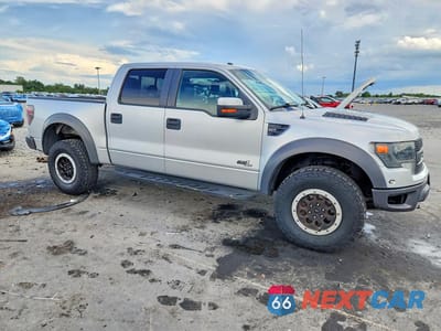 Czwarte zdjęcie samochodu z boku: 2014 FORD F150 SVT RAPTOR VIN:1FTFW1R62EFB99935 - miniatura