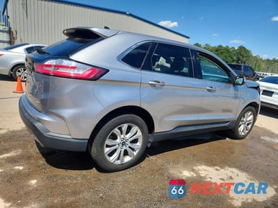 Trzecie zdjęcie samochodu z tyłu: 2022 FORD EDGE TITANIUM VIN:2FMPK4K96NBA31380 - miniatura