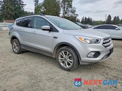 Czwarte zdjęcie samochodu z boku: 2018 FORD ESCAPE SE VIN:1FMCU9GD9JUC87147 - miniatura
