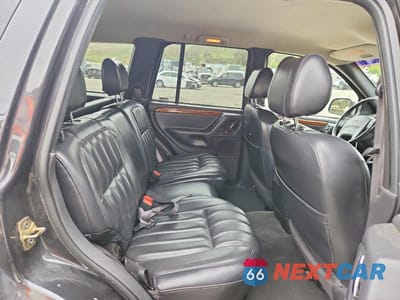 Zdjęcie 11 z 13 samochodu: 1999 JEEP GRAND CHEROKEE LIMITED VIN:1J4G268S3XC537241 - miniatura