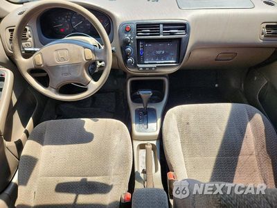 Zdjęcie 15 z 26 samochodu: 1999 HONDA CIVIC LX VIN:2HGEJ6670XH560411 - miniatura