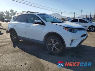 Czwarte zdjęcie samochodu z boku: 2016 TOYOTA RAV4 XLE VIN:JTMWFREVXGJ088612 - miniatura