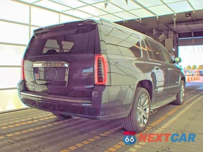 Czwarte zdjęcie samochodu z boku: 2015 GMC YUKON XL DENALI VIN:1GKS2JKJXFR501338 - miniatura