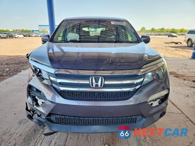 Piąte zdjęcie samochodu w środku: 2017 HONDA PILOT EXL VIN:5FNYF5H51HB031026 - miniatura