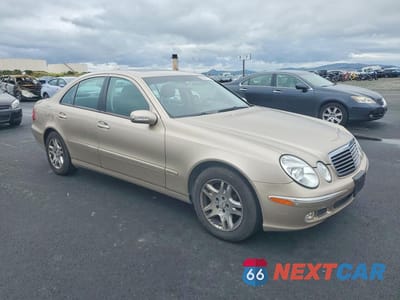 Czwarte zdjęcie samochodu z boku: 2005 MERCEDES-BENZ E 320 VIN:WDBUF65J55A612117 - miniatura