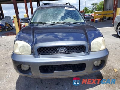 Piąte zdjęcie samochodu w środku: 2004 HYUNDAI SANTA FE GLS VIN:KM8SC13E44U582210 - miniatura