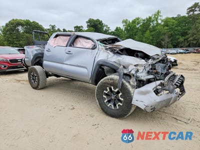 Czwarte zdjęcie samochodu z boku: 2018 TOYOTA TACOMA TRD OFF-ROAD VIN:3TMCZ5AN5JM165695 - miniatura