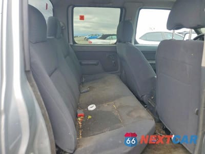 Zdjęcie 10 z 12 samochodu: 2002 NISSAN FRONTIER CREW CAB SC VIN:1N6MD29Y52C384494 - miniatura