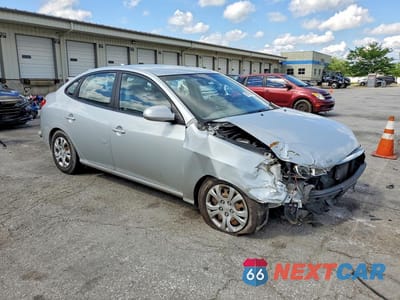 Czwarte zdjęcie samochodu z boku: 2010 HYUNDAI ELANTRA GLS VIN:KMHDU4AD7AU146609 - miniatura