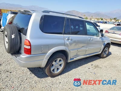 Trzecie zdjęcie samochodu z tyłu: 2002 SUZUKI GRAND VITARA XL7 LIMITED VIN:JS3TY92V824107166 - miniatura