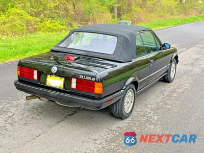 Czwarte zdjęcie samochodu z boku: 1991 BMW 318 I VIN:WBABA7311MEJ10161 - miniatura