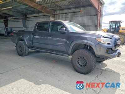 Czwarte zdjęcie samochodu z boku: 2016 TOYOTA TACOMA TRD SPORT VIN:3TMDZ5BN0GM001959 - miniatura