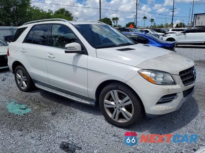 Czwarte zdjęcie samochodu z boku: 2014 MERCEDES-BENZ ML 350 BLUETEC VIN:4JGDA2EB2EA332779 - miniatura