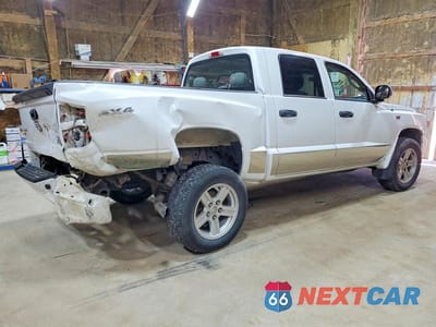 Trzecie zdjęcie samochodu z tyłu: 2011 DODGE DAKOTA SLT VIN:1D7RW3GP7BS712951 - miniatura