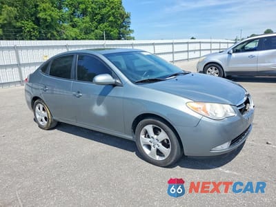 Czwarte zdjęcie samochodu z boku: 2010 HYUNDAI ELANTRA SE VIN:KMHDU4AD6AU933101 - miniatura