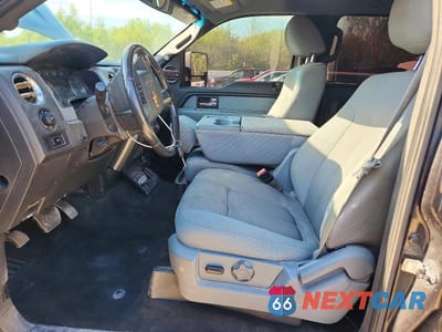 Zdjęcie 7 z 12 samochodu: 2014 FORD F150 SUPERCREW VIN:1FTFW1ET0EKE96088 - miniatura