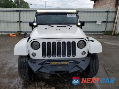 Piąte zdjęcie samochodu w środku: 2014 JEEP WRANGLER UNLIMITED SAHARA VIN:1C4BJWEG5EL146902 - miniatura