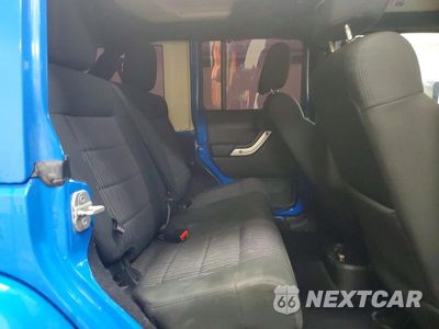 Zdjęcie 11 z 13 samochodu: 2011 JEEP WRANGLER UNLIMITED SAHARA VIN:1J4BA5H16BL600159 - miniatura