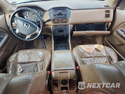 Zdjęcie 8 z 13 samochodu: 2004 HONDA PILOT VIN:5FNYF18554B002969 - miniatura