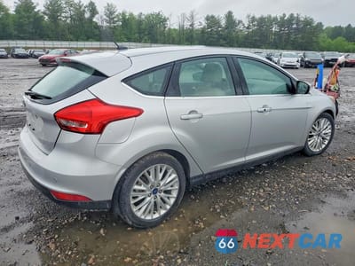 Trzecie zdjęcie samochodu z tyłu: 2018 FORD FOCUS TITANIUM VIN:1FADP3N27JL271877 - miniatura