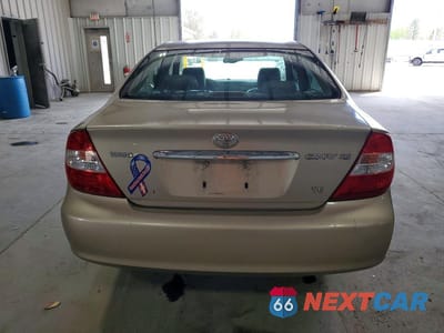 Zdjęcie 6 z 13 samochodu: 2003 TOYOTA CAMRY XLE V6 VIN:JTDBF30K730151318 - miniatura