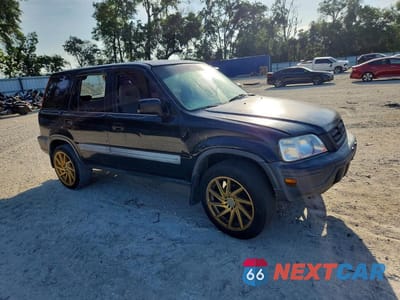 Czwarte zdjęcie samochodu z boku: 1998 HONDA CR-V LX VIN:JHLRD2843WC002608 - miniatura