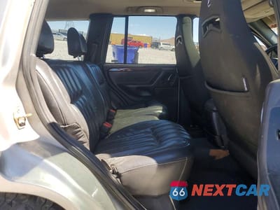 Zdjęcie 11 z 13 samochodu: 2000 JEEP GRAND CHEROKEE LIMITED VIN:1J4GW58N0YC359038 - miniatura