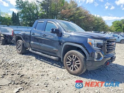 Czwarte zdjęcie samochodu z boku: 2019 GMC SIERRA K1500 AT4 VIN:1GTR9EED3KZ174231 - miniatura