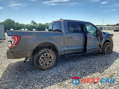 Trzecie zdjęcie samochodu z tyłu: 2023 FORD F150 SUPERCREW VIN:1FTFW1E81PFA49874 - miniatura