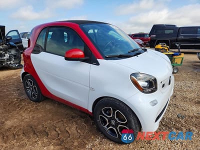Czwarte zdjęcie samochodu z boku: 2018 SMART FORTWO VIN:WMEFJ9BA0JK283377 - miniatura