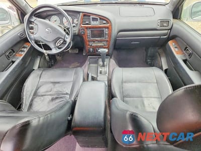 Zdjęcie 8 z 13 samochodu: 2002 NISSAN PATHFINDER SE VIN:JN8DR09YX2W713900 - miniatura