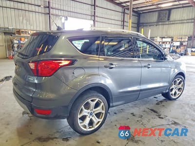 Trzecie zdjęcie samochodu z tyłu: 2019 FORD ESCAPE TITANIUM VIN:1FMCU0J90KUA90594 - miniatura