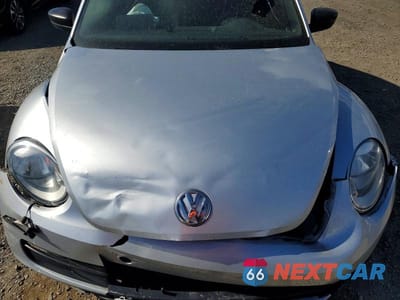 Zdjęcie 11 z 12 samochodu: 2014 VOLKSWAGEN BEETLE VIN:3VWFP7AT6EM621381 - miniatura