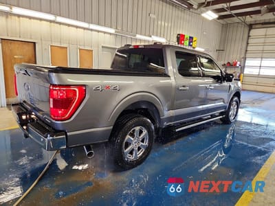 Trzecie zdjęcie samochodu z tyłu: 2021 FORD F150 SUPERCREW VIN:1FTFW1E86MFC81818 - miniatura