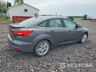 Trzecie zdjęcie samochodu z tyłu: 2018 FORD FOCUS TITANIUM VIN:1FADP3J21JL293928 - miniatura