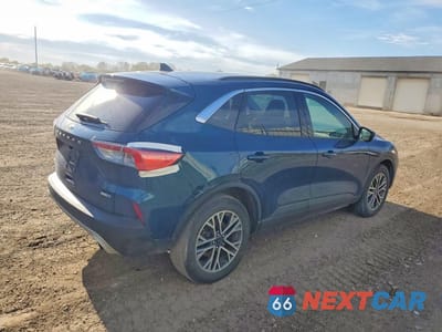 Trzecie zdjęcie samochodu z tyłu: 2020 FORD ESCAPE SEL VIN:1FMCU9H61LUB63909 - miniatura