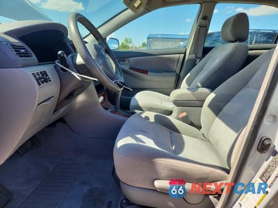 Zdjęcie 7 z 13 samochodu: 2007 TOYOTA COROLLA LE VIN:2T1BR30E97C722840 - miniatura