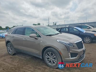 Czwarte zdjęcie samochodu z boku: 2023 CADILLAC XT5 VIN:1GYKNDRSXPZ132026 - miniatura