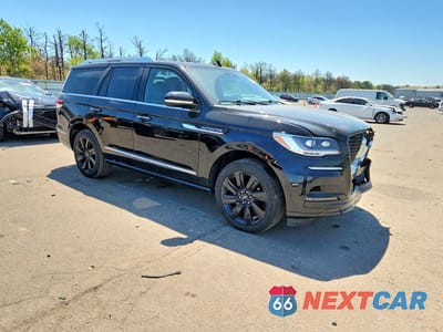 Czwarte zdjęcie samochodu z boku: 2023 LINCOLN NAVIGATOR RESERVE VIN:5LMJJ2LG7PEL10433 - miniatura