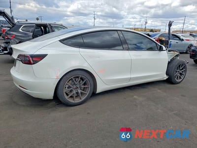 Trzecie zdjęcie samochodu z tyłu: 2021 TESLA MODEL 3 VIN:5YJ3E1EA0MF073222 - miniatura