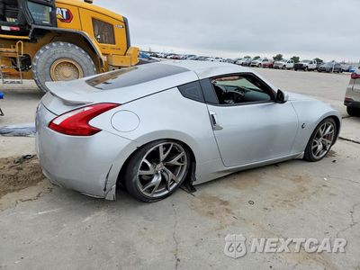 Trzecie zdjęcie samochodu z tyłu: 2014 NISSAN 370Z BASE VIN:JN1AZ4EH8EM630173 - miniatura