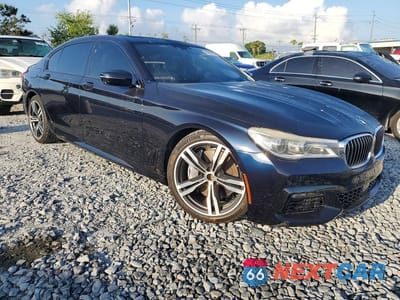Czwarte zdjęcie samochodu z boku: 2016 BMW 750 I VIN:WBA7F0C55GGM20713 - miniatura