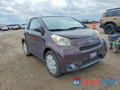Czwarte zdjęcie samochodu z boku: 2012 SCION IQ BASE VIN:JTNJJXB05CJ021461 - miniatura